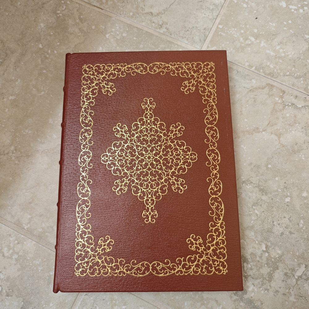 Elegant Brown Leather Book with Gold Detailing